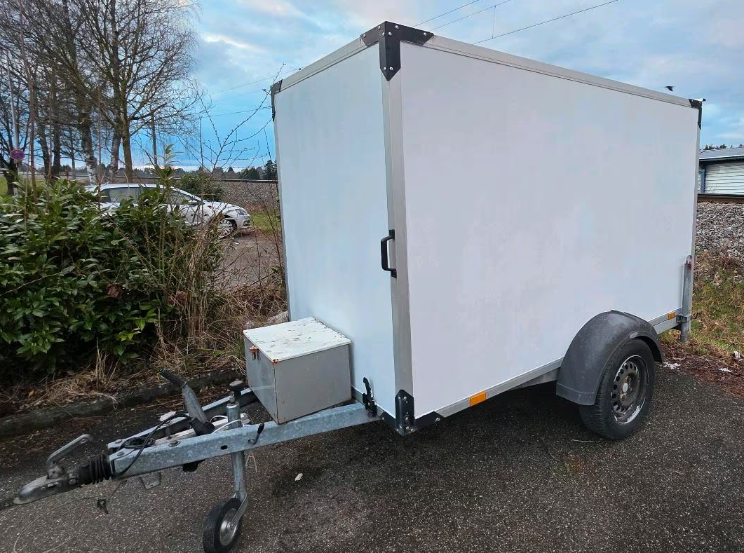 Kompakter Kofferanhänger